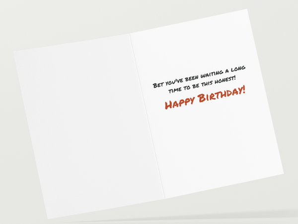 Image of the inside of a birthday card for old people with text that says, "Bet you've been waiting a long time to be that hones!" in black, and "Happy Birthday" in red.