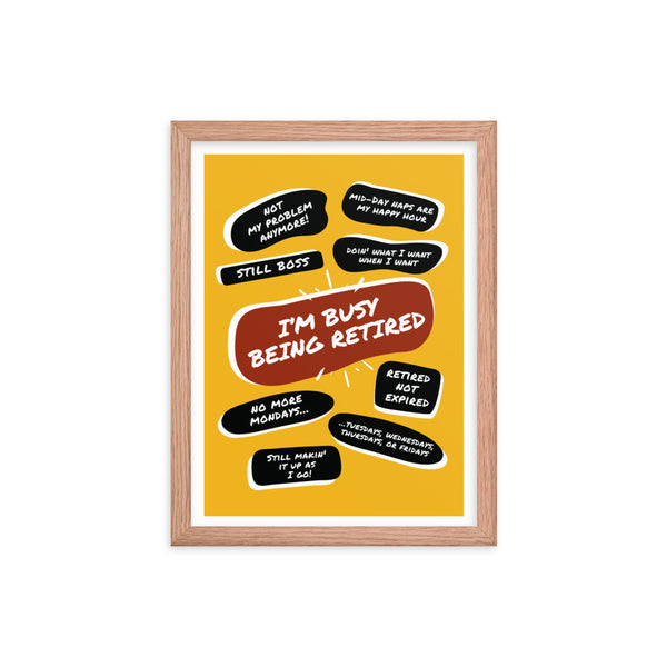 Pictured is a red oak wood framed yellow poster print with a large red quote bubble in the center that says, Im Busy Being Retired. Several more quote bubbles surround it with funny retirement quips.